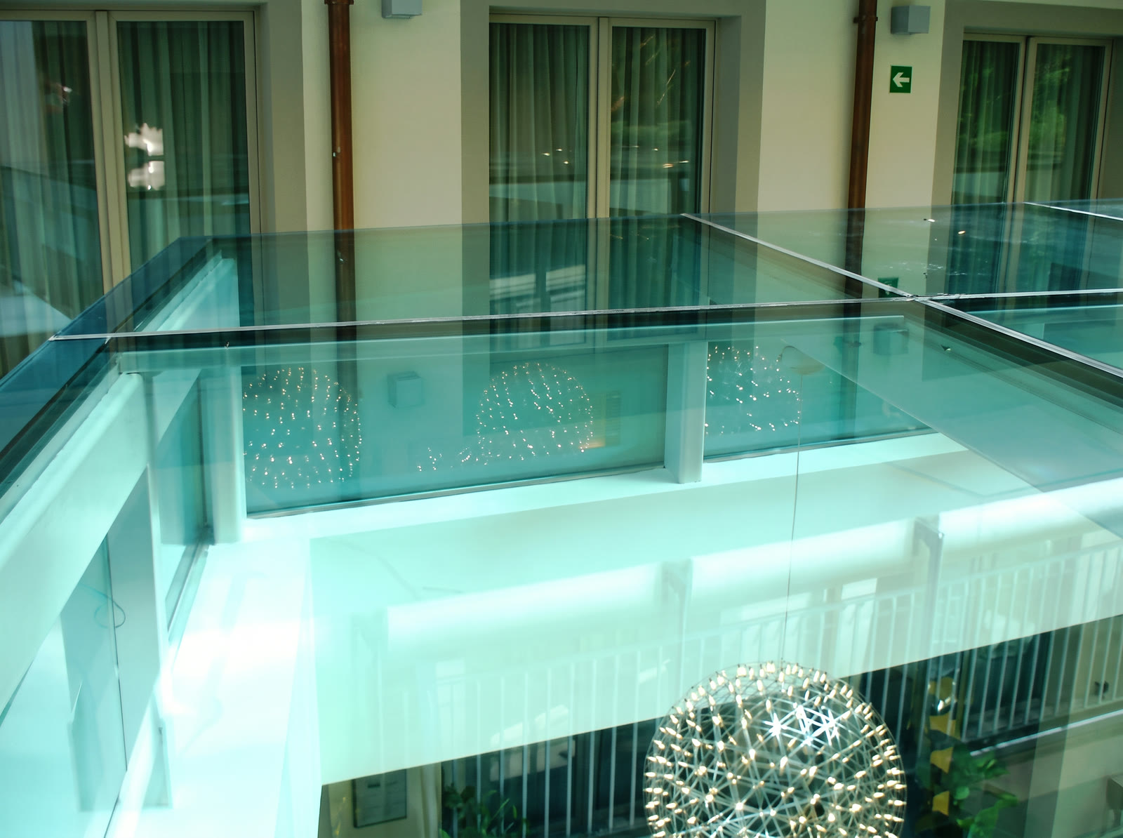 Treated horizontal glass roof above the breakfast area
